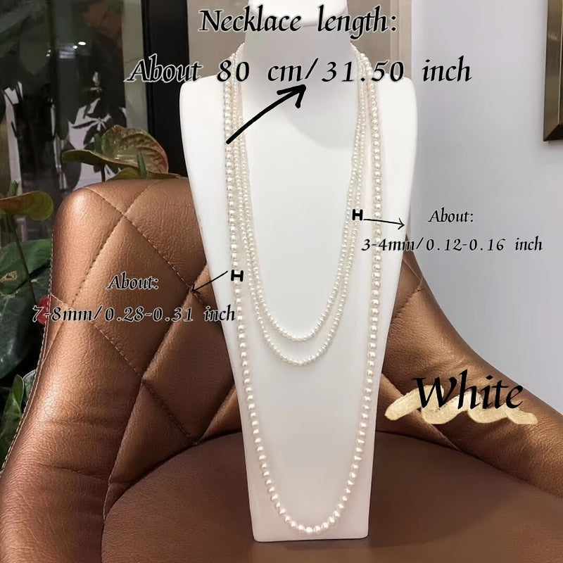 This multi-layered freshwater pearl sweater necklace exudes elegance with its combination of 3-4mm and 7-8mm beads. Perfect for special occasions such as dates, weddings, proposals, Mother's Day, Valentine's, and anniversaries. Comes in a gift box for a