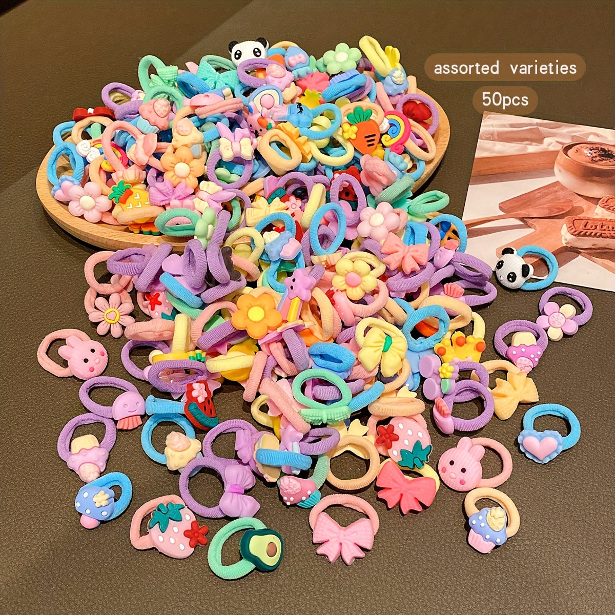 50 cute cartoon styles of randomly assorted rubber bands; sweet and stylish hair accessories for daily use.