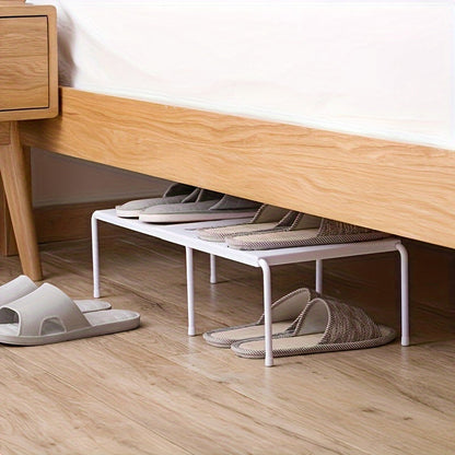 Telescopic shoe rack made of durable plastic, designed to save space and efficiently store slippers and shoes. Ideal for use in the kitchen, living room, or dorm room. No assembly required, making it the perfect shoe storage organizer.