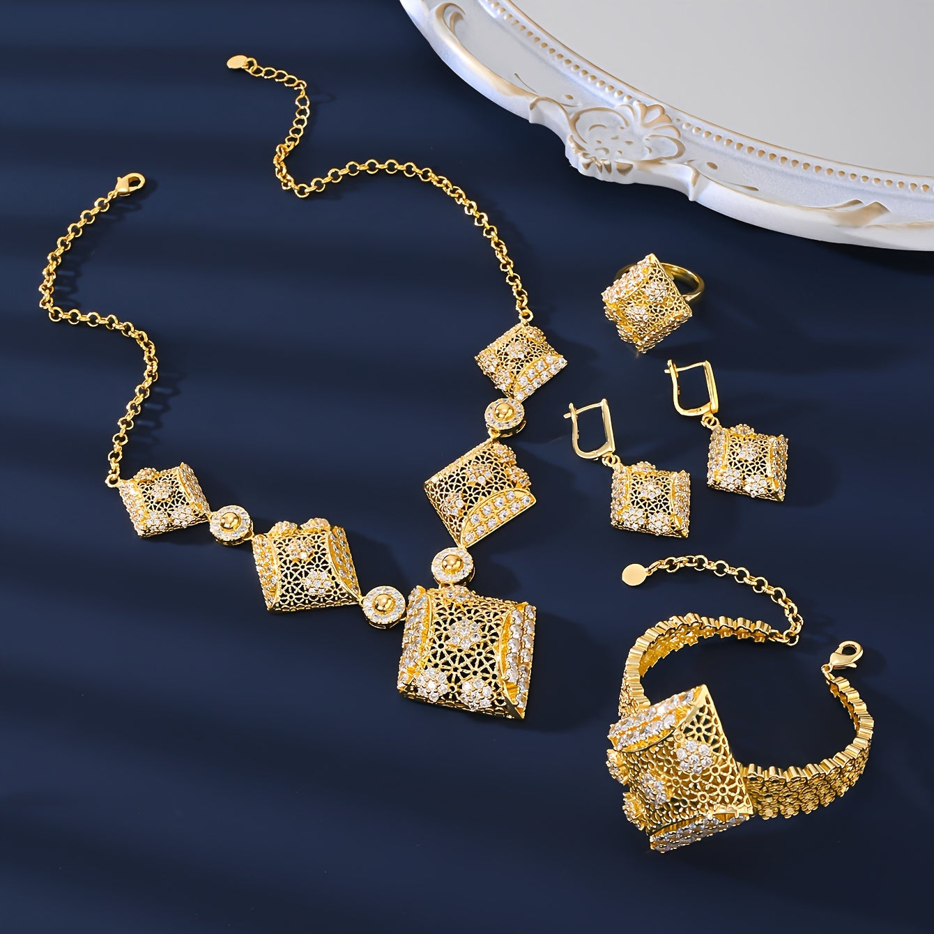 Indulge in Opulence with the MEIZ Luxury Bohemian Jewelry Set - 18K Golden Plated Copper adorned with Natural Zirconia Stones. Perfect for Daily Wear or Special Gifts for Women, this versatile Earrings, Necklace, and Ring Set is inspired by a Holiday