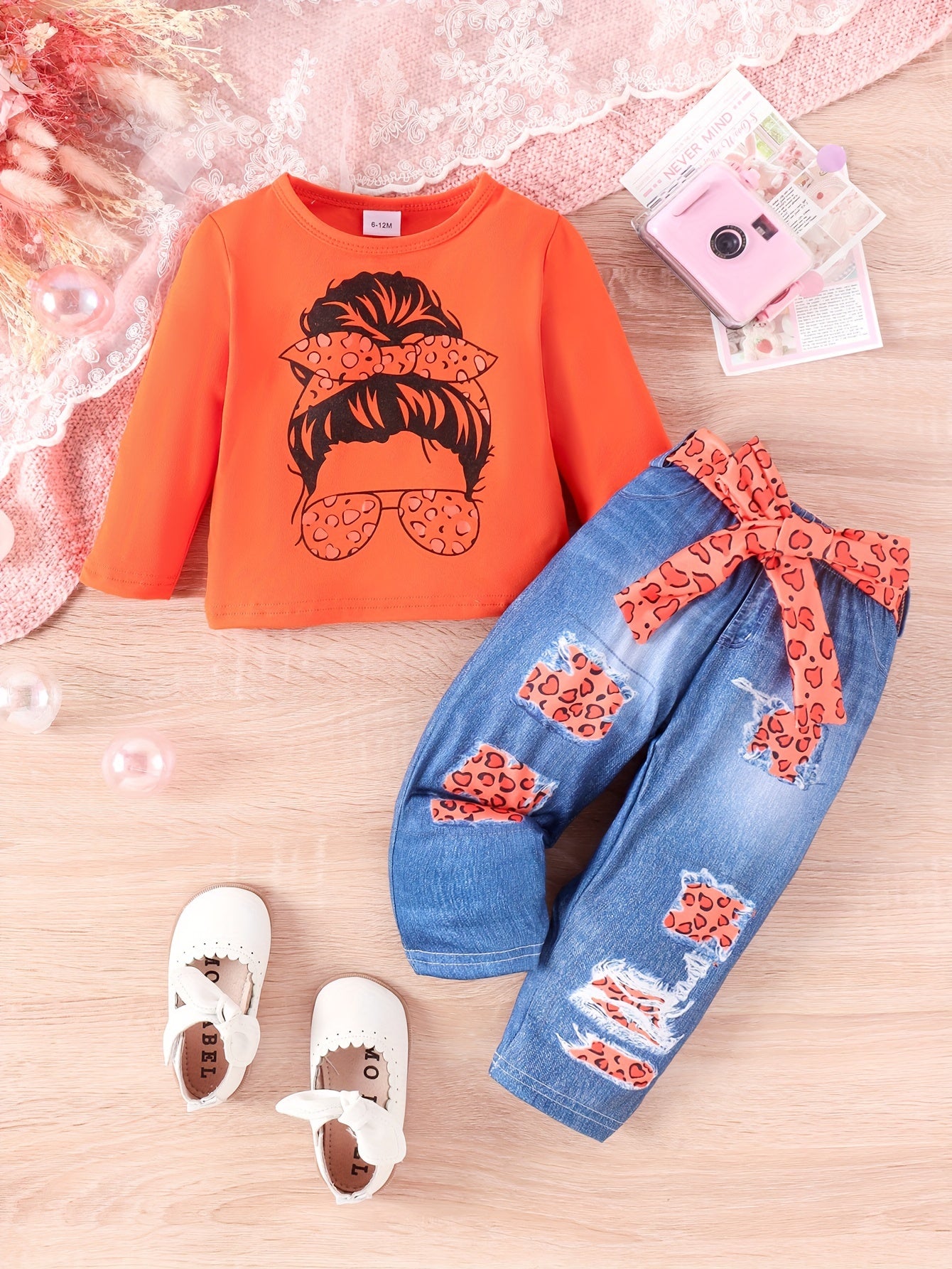 3-piece outdoor set for infant and toddler girls with long sleeve cartoon top and faux jeans with belt, featuring a cute Girl Head print.