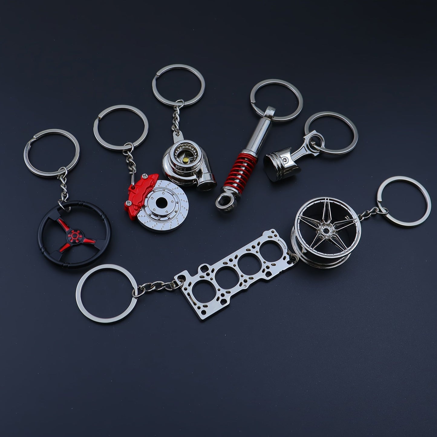 Set of 7 Car Enthusiast Keychains - Sleek Black Zinc Alloy, featuring Engine Block, Turbo, Wheel Hubs, and More - Ideal Gift for Guys