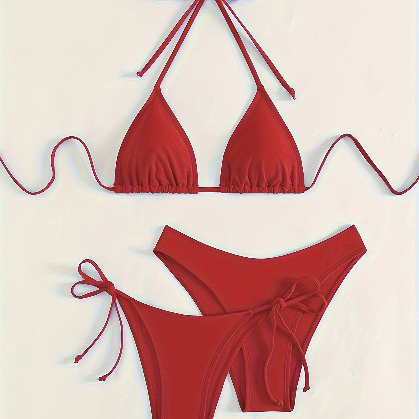 Solid color 3-piece bikini set with halter neck and backless design. Ideal for women's swimwear and clothing.