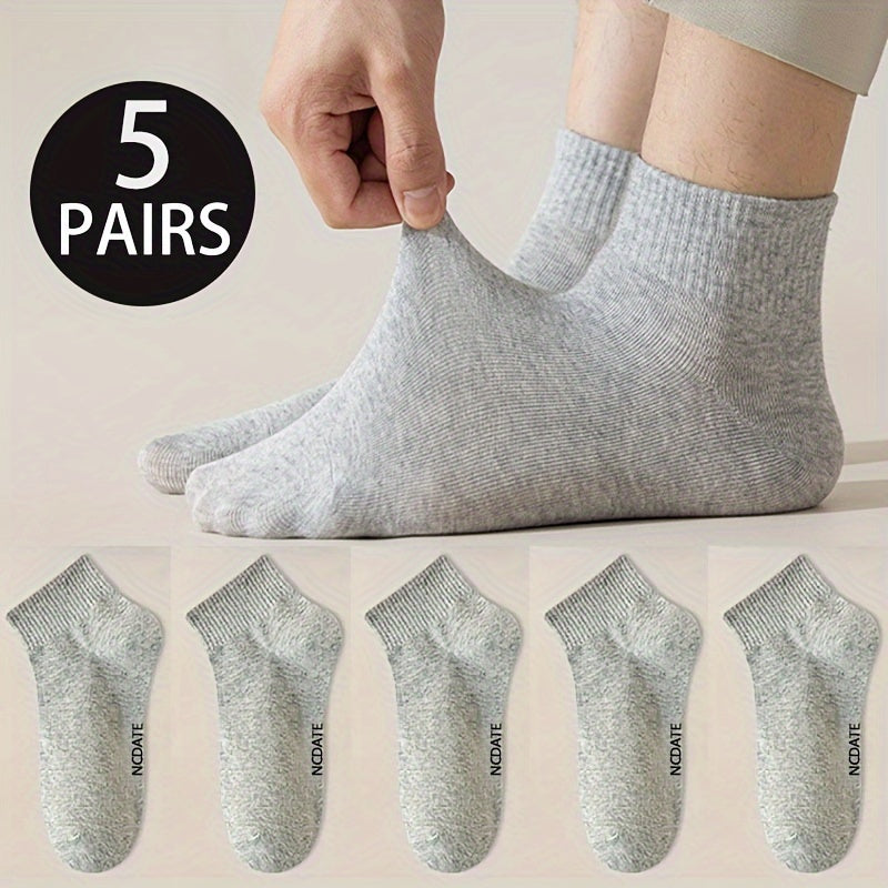 5 pairs of men's short crew socks for casual or sports use outdoors.