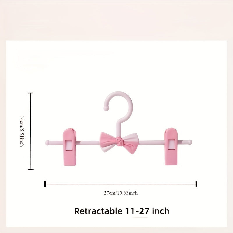 Convenient 27.94-68.58 cm Retractable Plastic Pants Hanger with Bow Clips - Ideal for Children's Clothing