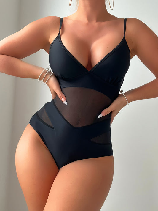 Seductive one-piece swimsuits with mesh high waist, plunging V-neck, and cut-out details.