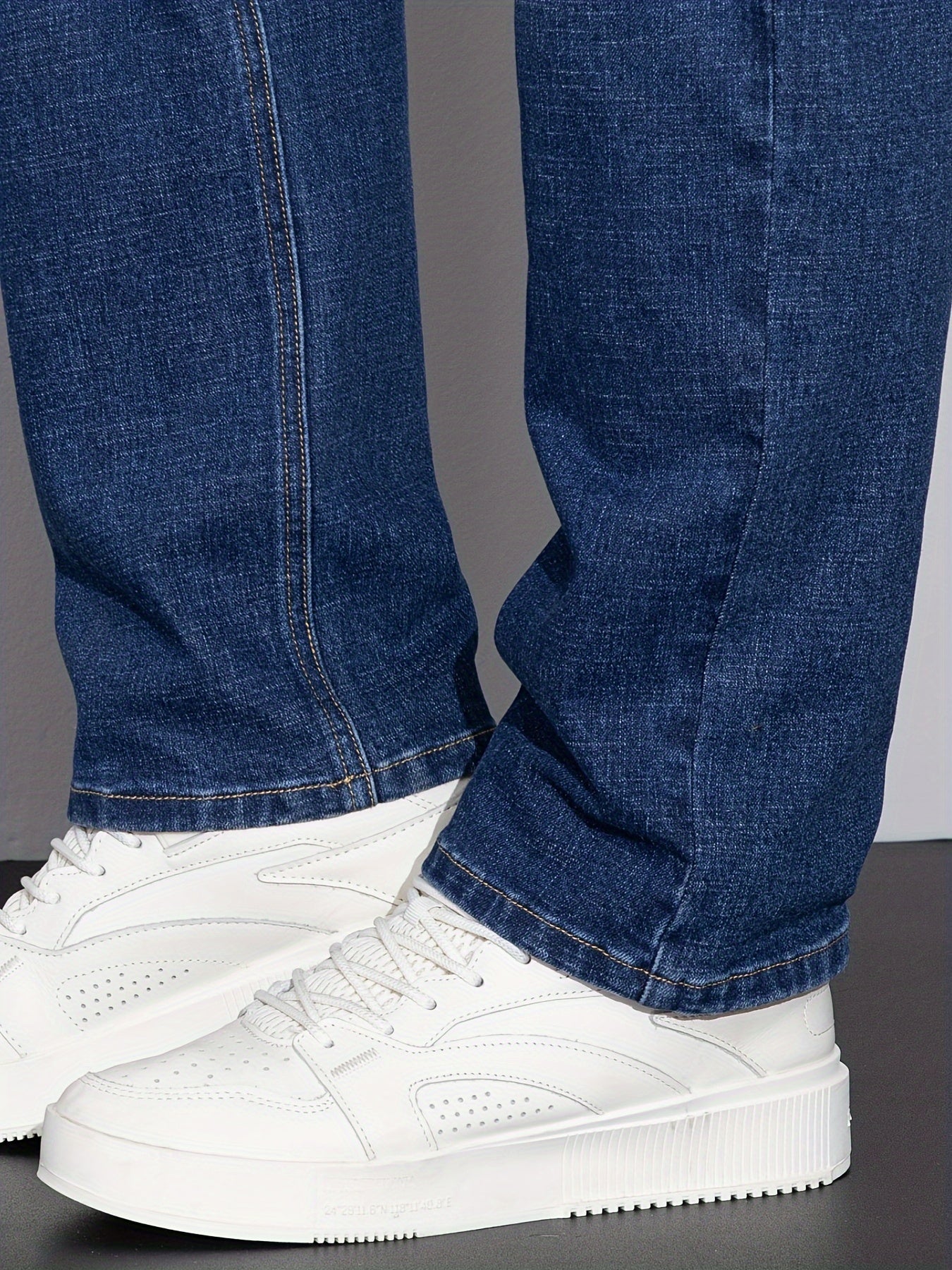 Cotton denim jeans for men in plus sizes, designed for comfort in all seasons with a regular fit.