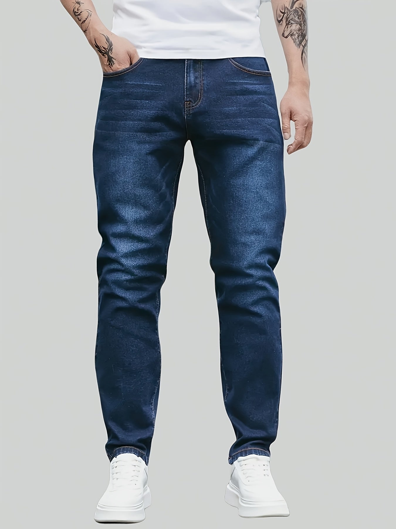 Men's denim jeans in plus size with a straight leg cut, made of 65% cotton, 33.7% polyester, and 1.3% spandex. Features medium stretch, all-season comfort, solid washed style, and 370gsm