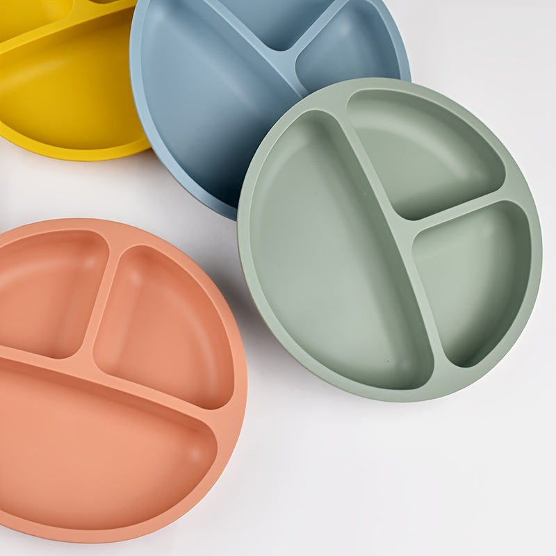 Three-compartment round dinner plate made of 100% food-grade silicone, featuring a reinforced design for added thickness and durability. This high-temperature resistant soft plate is perfect for training and comes with training tableware compartments.