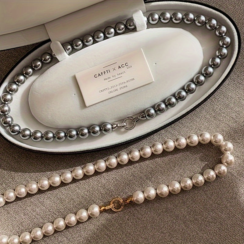 Stylish and minimalist 8mm faux pearl necklace featuring shell pearls, synthetic August birthstone, plated design, perfect for everyday wear or vacation. Great gift for Valentine's Day. Versatile for all seasons.