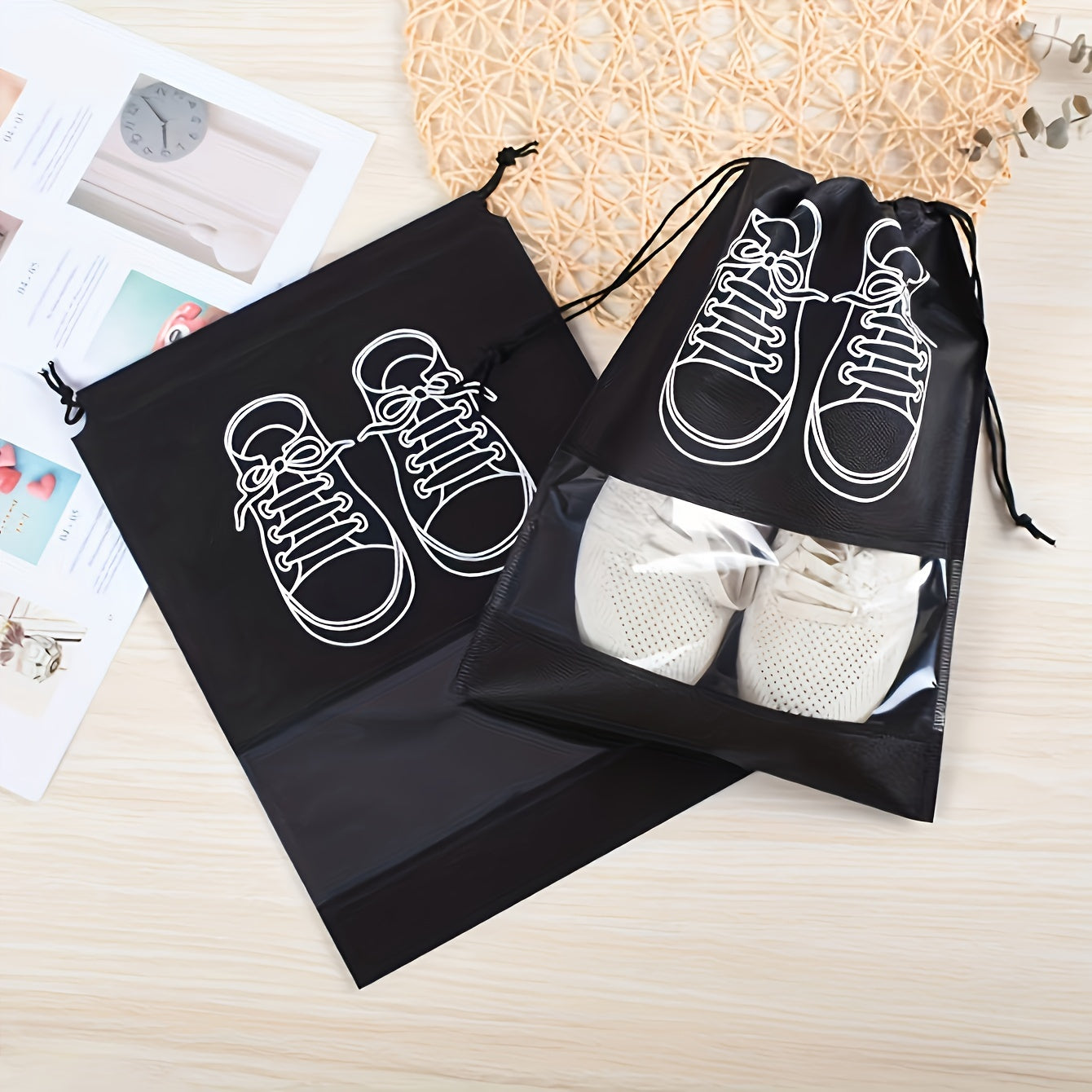 5 Portable shoe storage bags with drawstring made of waterproof, non-woven fabric for travel and closet organization.