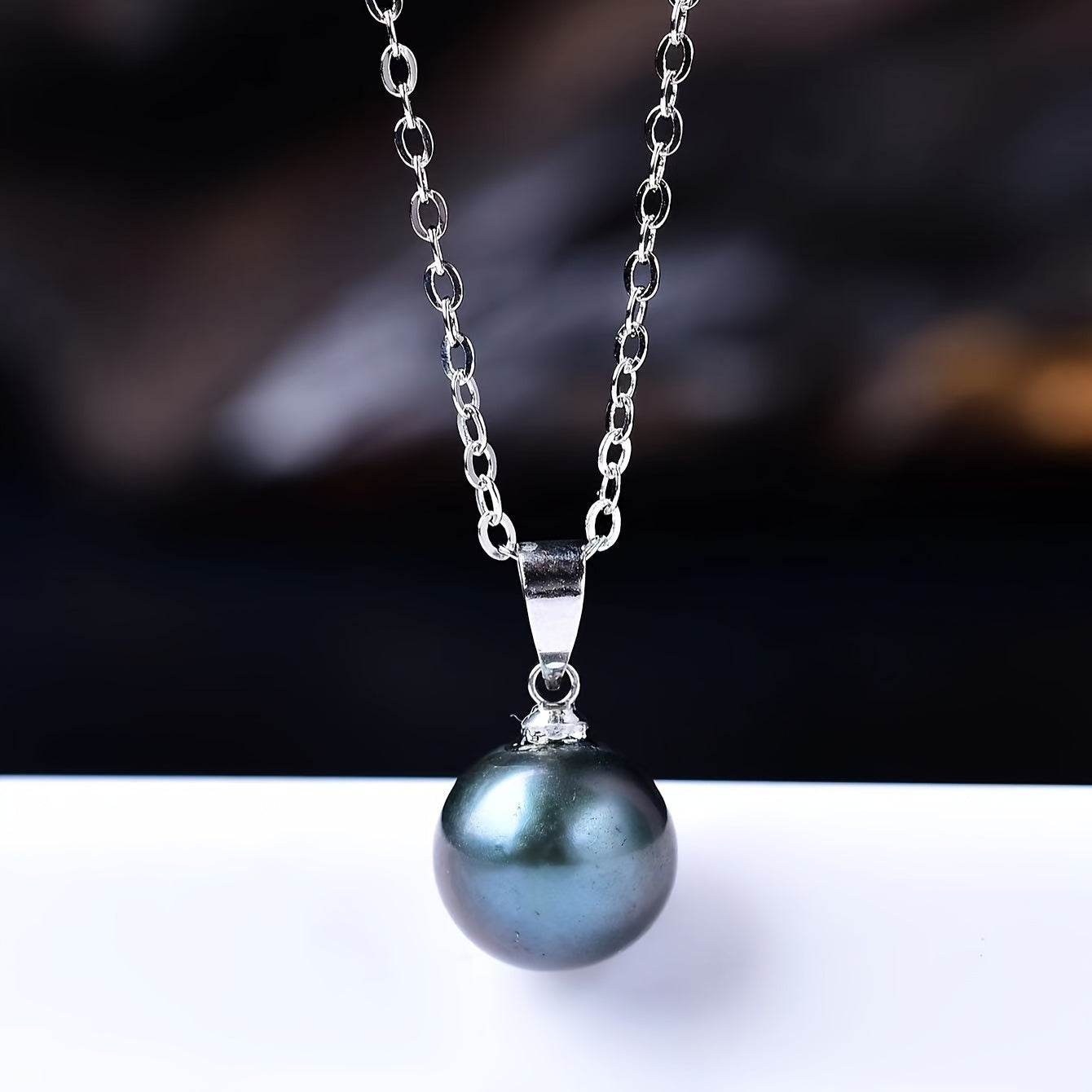 A stunning black pearl pendant necklace in elegant Bohemian style, crafted from S925 Sterling Silver and featuring a lustrous freshwater pearl. Perfect for everyday wear or as a thoughtful gift for a special woman.