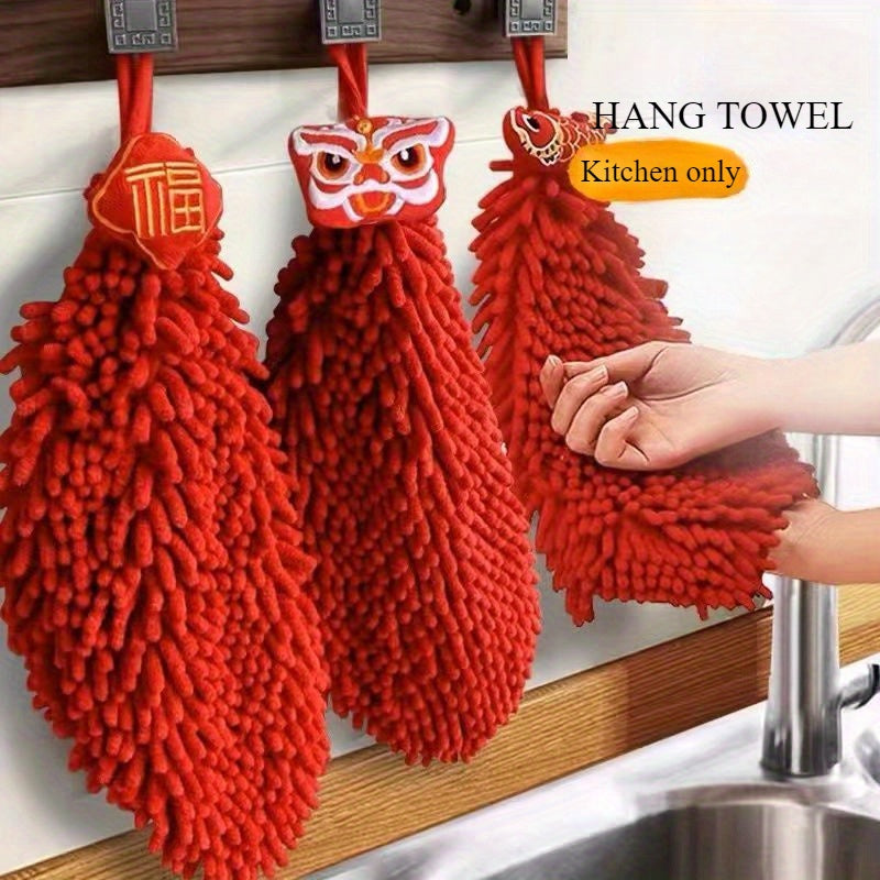 Red chenille hand towel for kitchen and bathroom décor with festive hanging design.