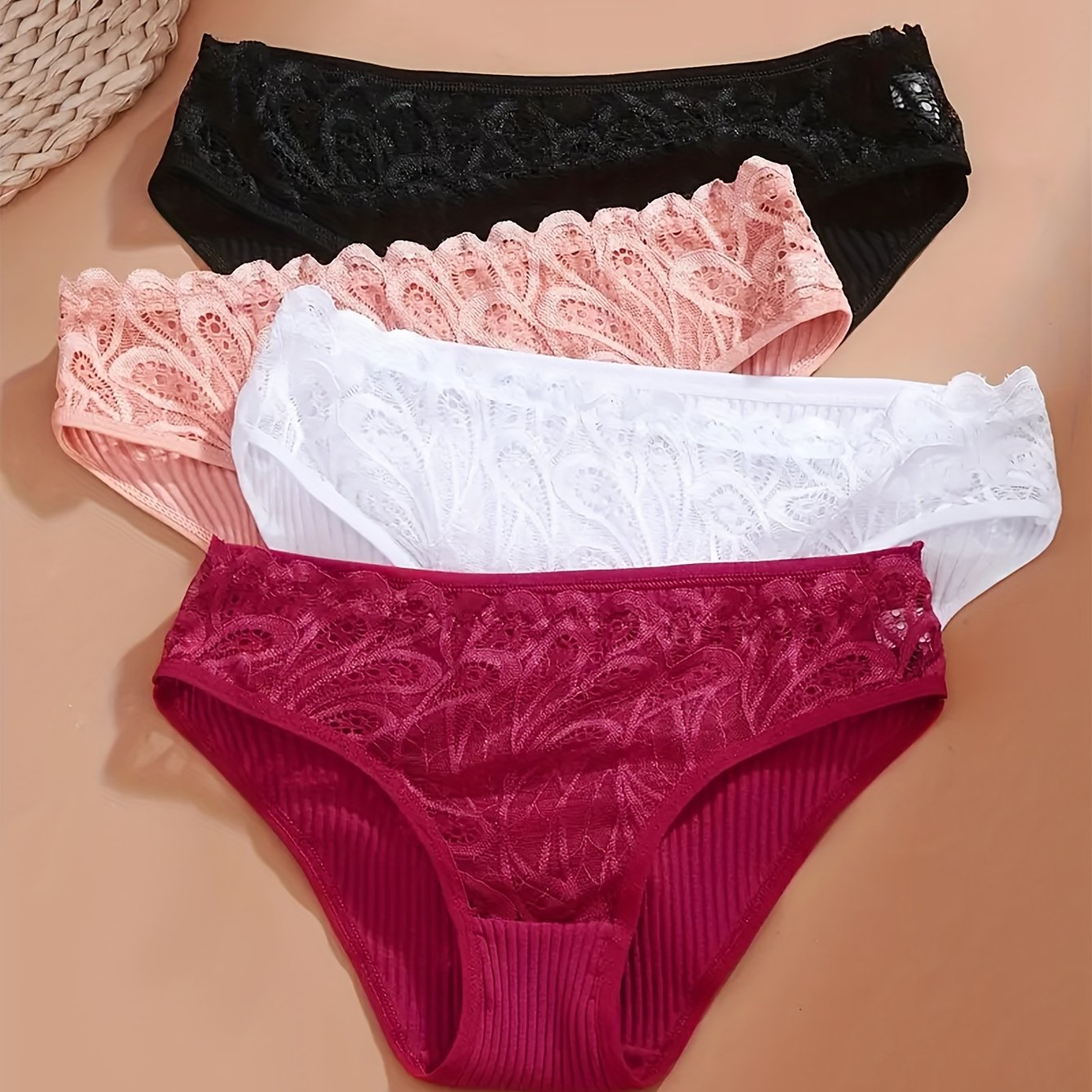 4-pack of lace trim briefs for women, made of comfortable breathable cotton.