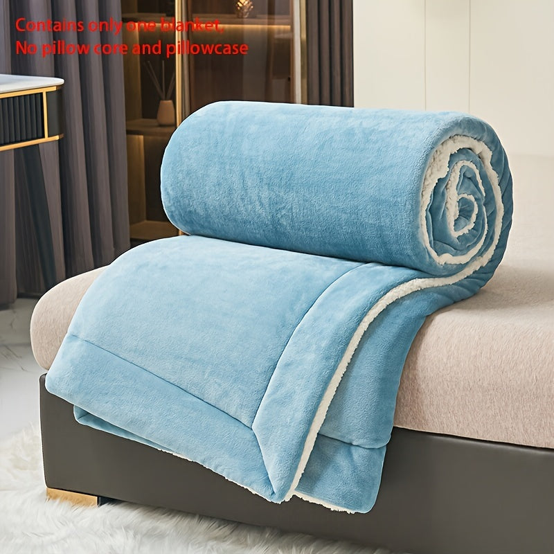 Light blue double layer blanket made of milk fleece and lamb fleece with crimping, perfect for casual relaxing, as a throw blanket, or for a cozy lunch break.