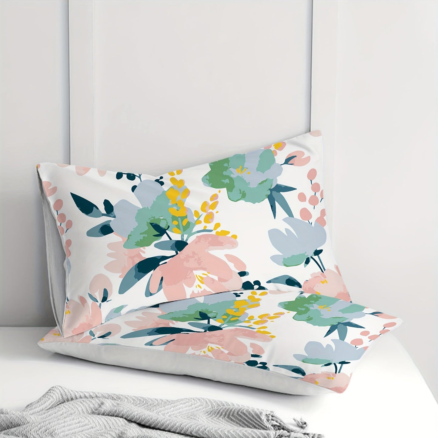 Transform your bedroom or sofa with these two elegant floral print pillowcases. Made from soft and comfortable brushed polyester, they are perfect for adding a cozy touch to your home decor. These pillowcases feature an envelope closure and are machine