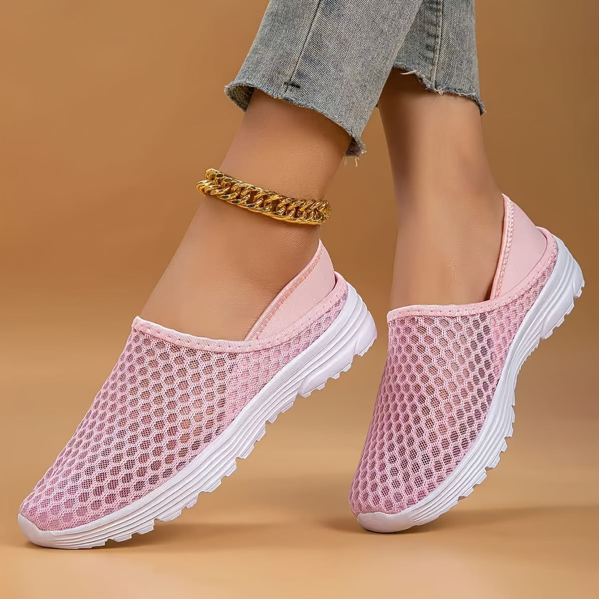 Mesh slip-on walking shoes with stability support, lightweight white summer footwear.