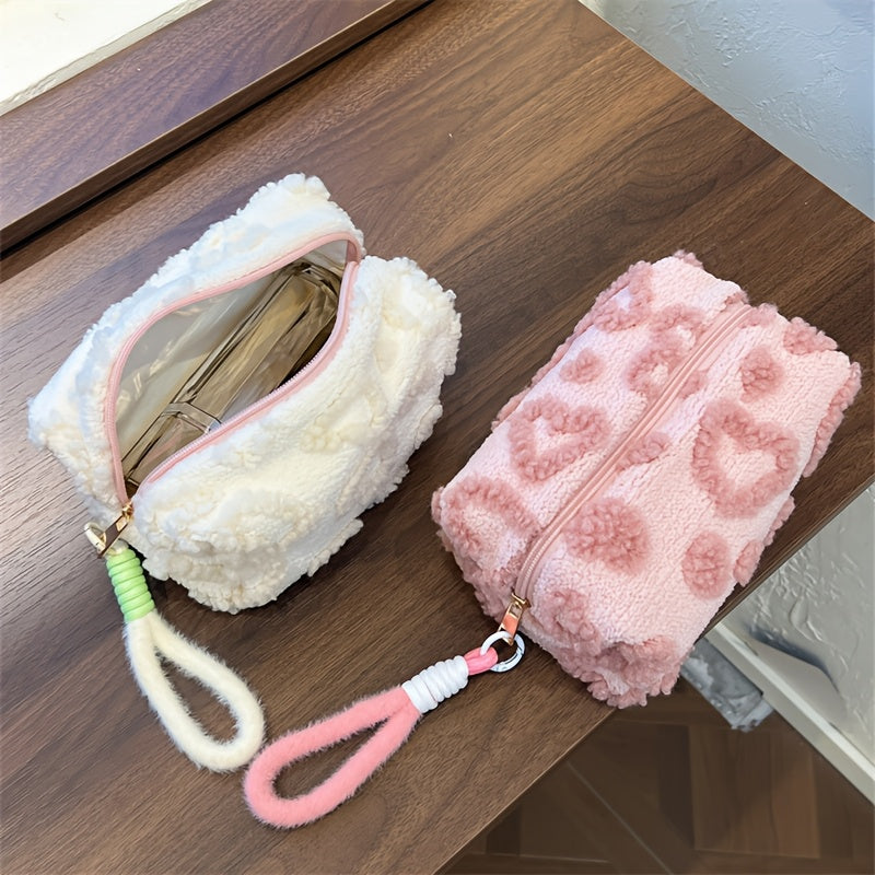 Heart-shaped hand carry bag for women, ideal for on-the-go skin care and cosmetic storage.