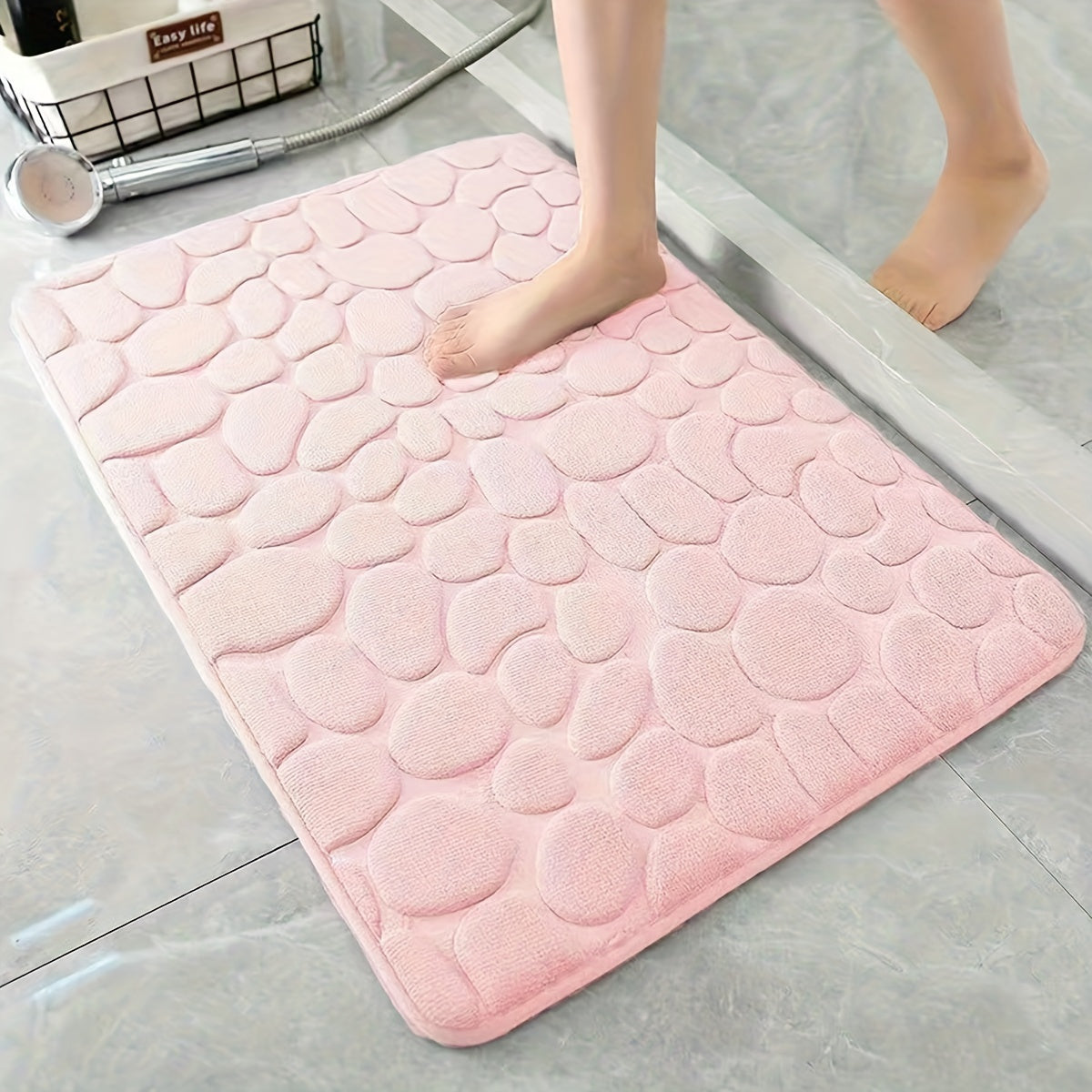 Pamper Your Feet with our Luxurious 3D Pebble Design Bath Rug! This Quick-Dry Non-Slip Bathroom Mat is made of Soft and Comfortable Polyester Memory Foam. It is Woven with a density of 700gsm and is 1.5cm Thick. Perfect for Home Decor and as Holiday