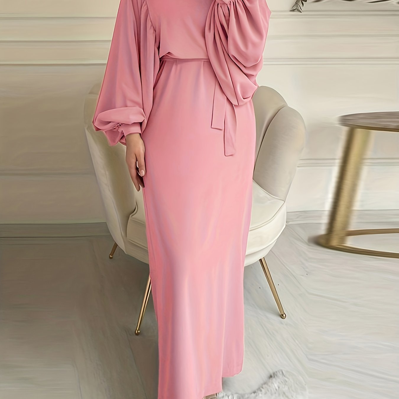 Elegant maxi abaya dress with solid tie waist and lantern sleeves.