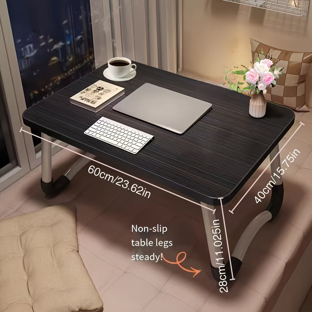 Portable folding laptop desk with nonslip legs, compact for home and dorm use, sturdy wooden stand with rounded corners.