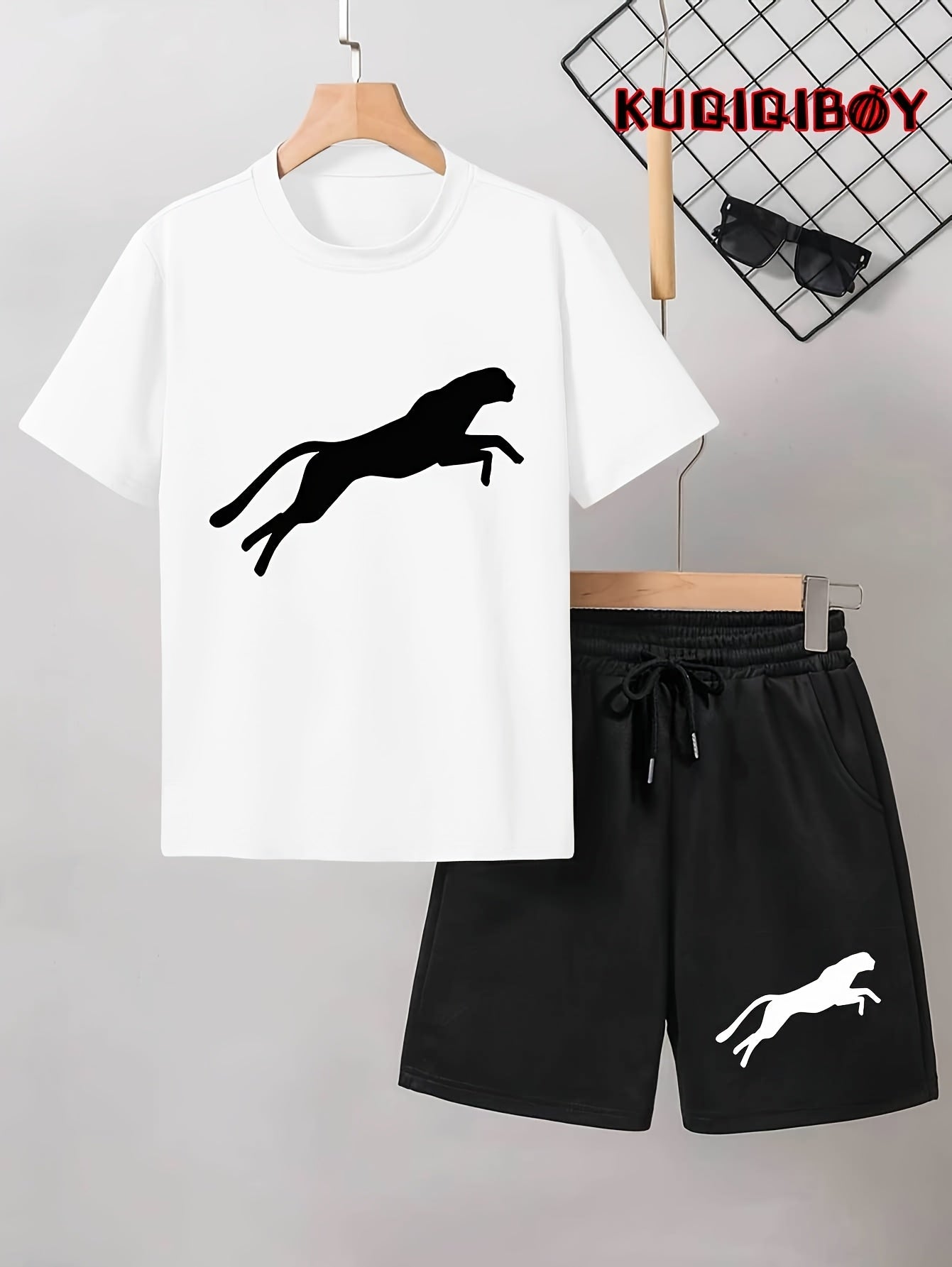 Men's casual Leopard Print Tee and Shorts Set in Light Gray with a Black Leopard silhouette on the t-shirt and White Leopard design on the black shorts. Made of a polyester blend for a