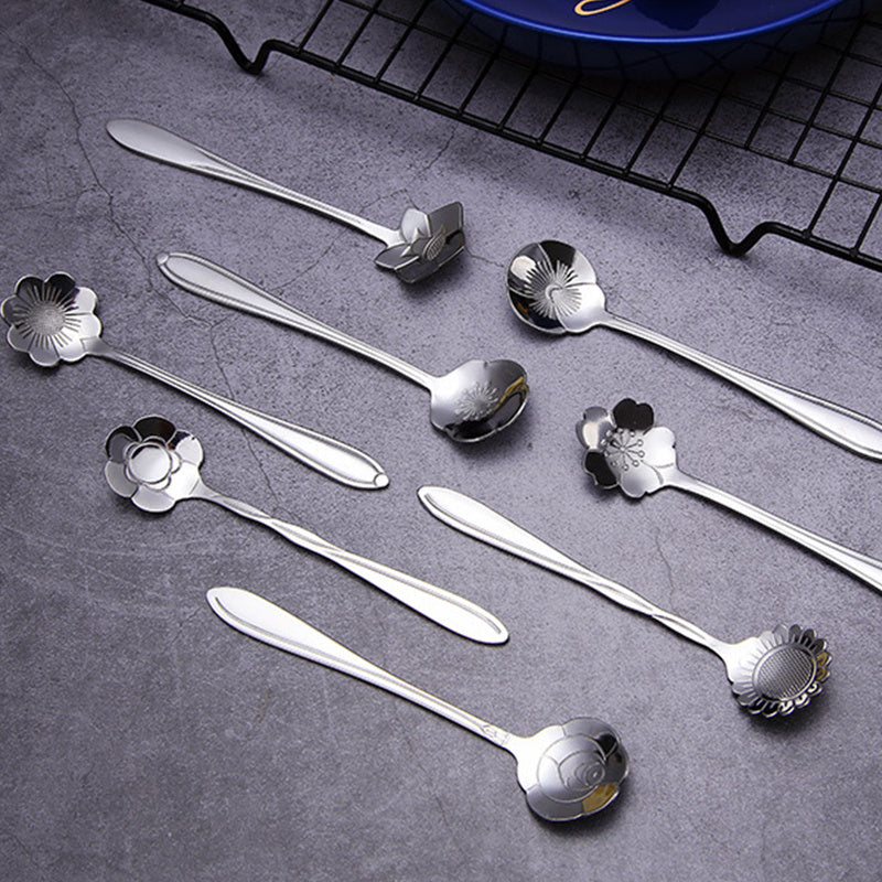 Golden stainless steel coffee and dessert spoons set with floral and geometric designs, ideal for tea, cake, and ice cream; great for weddings and coffee bars.