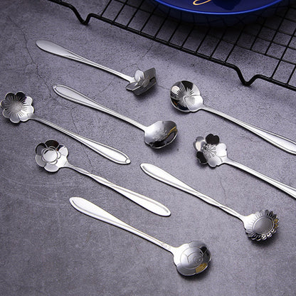 Golden stainless steel coffee and dessert spoons set with floral and geometric designs, ideal for tea, cake, and ice cream; great for weddings and coffee bars.