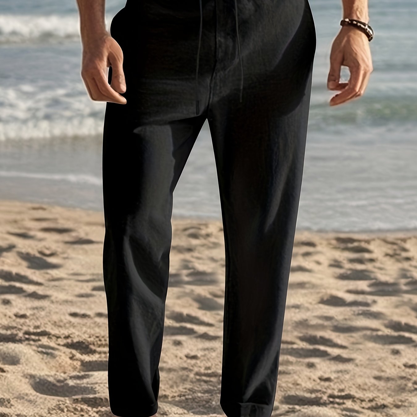 Breathable black linen hip hop pants for men, perfect for casual and outdoor wear.