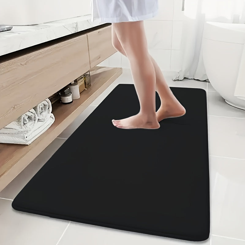 Soft and durable polyester bathroom mat with geometric design, ideal for shower, bathtub, bedroom, and living room. Versatile and non-slip, it is highly absorbent and machine washable.