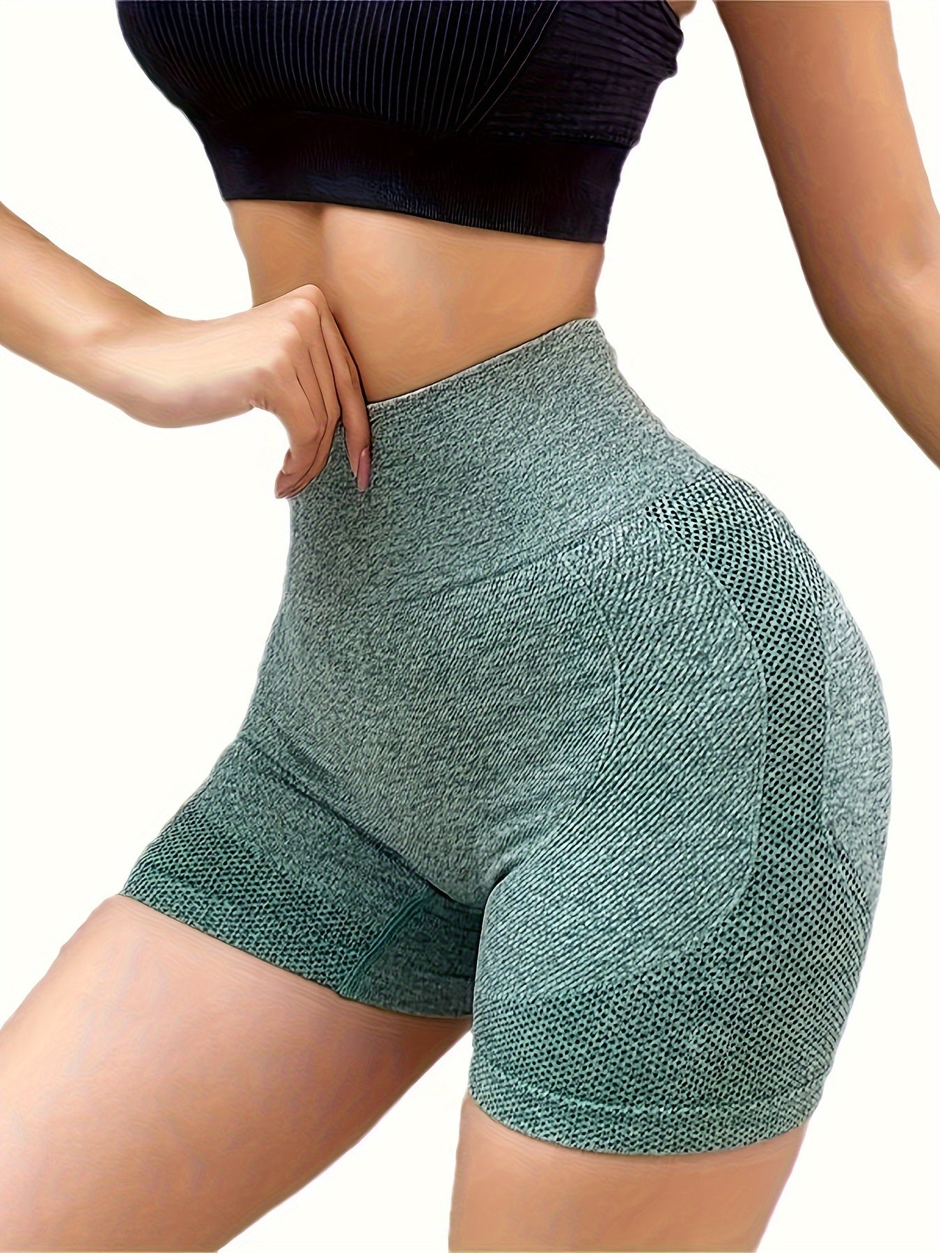 High-waisted tummy control yoga shorts with peach lift, butt lifter, made of knit polyester fabric, solid color, lined and comfortable for exercise.