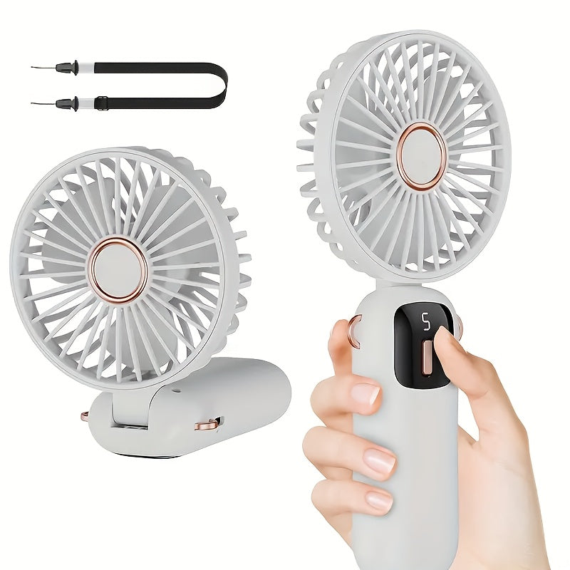 Sleek and stylish white and rose gold Compact & Portable USB Rechargeable Mini Fan with Neck Strap. Perfect for use in the office, classroom, or while traveling. Features a 1200mAh Lithium Battery, desk stand, and includes a power cable for convenient