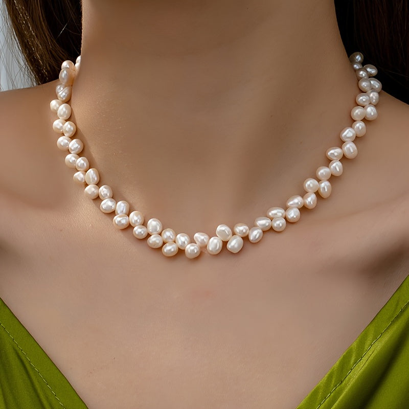 Mother's Day new style elegant small freshwater pearl necklace with a baroque, irregular shape. This light luxury clavicle chain features 80 pieces of 8mm natural, fresh water pearls for a small and elegant look.