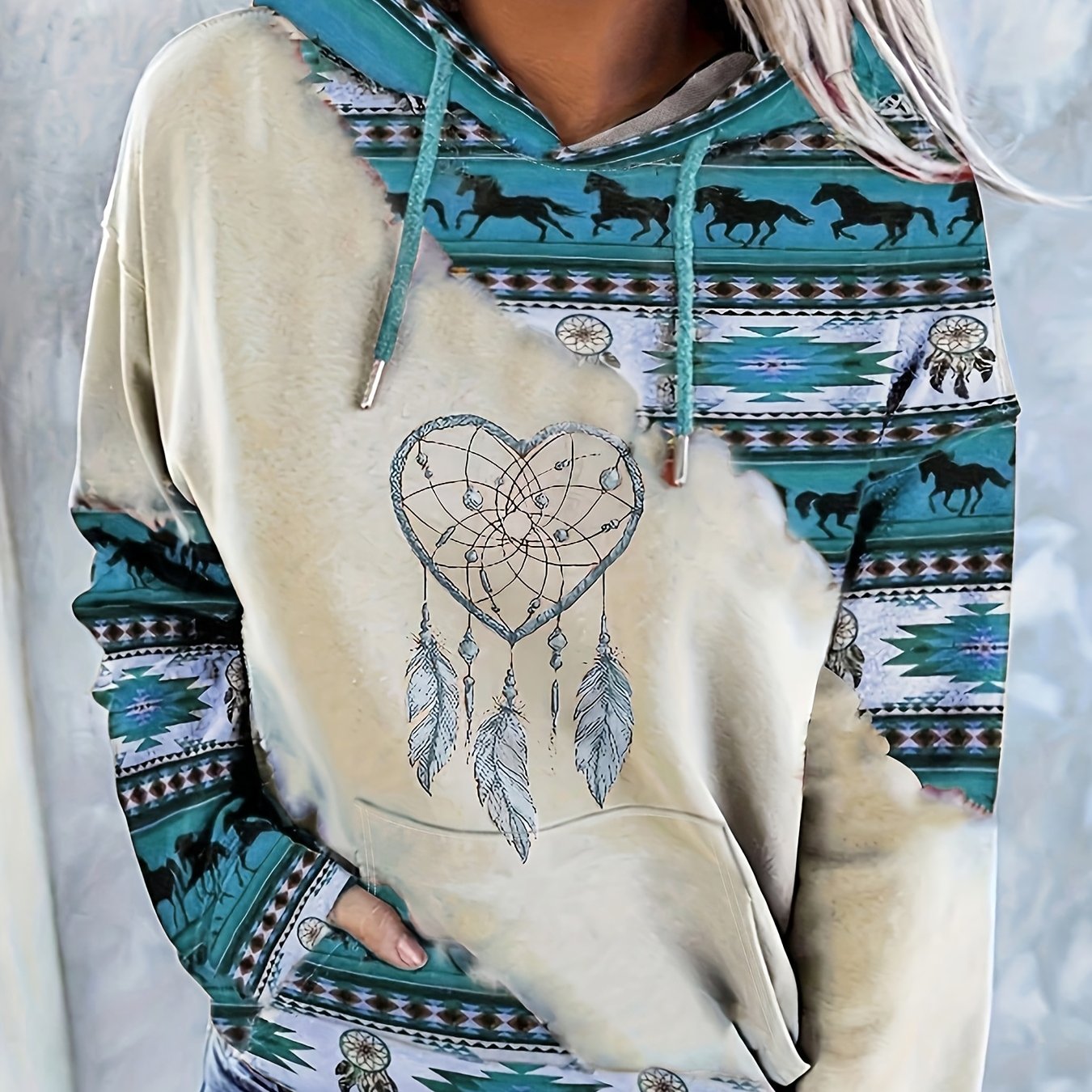 Casual hooded sweatshirt for women with ethnic print, knit fabric, and drawstring.