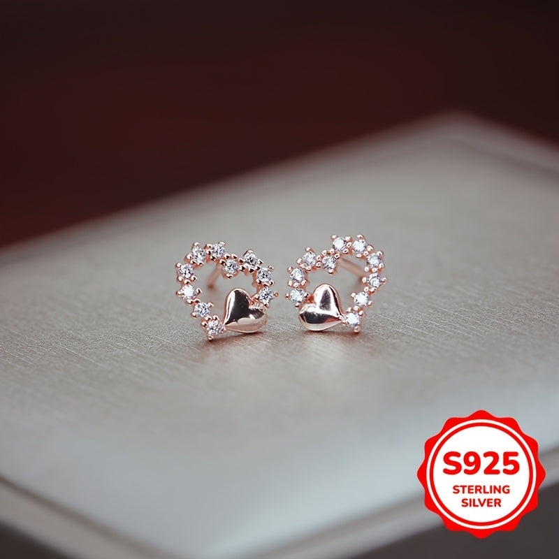 These graceful heart-shaped earrings are crafted from S925 silver with synthetic zirconia stones. Their simple and minimalist design is perfect for girls who prefer a cool and elegant style. These versatile earrings make a great gift for birthdays or