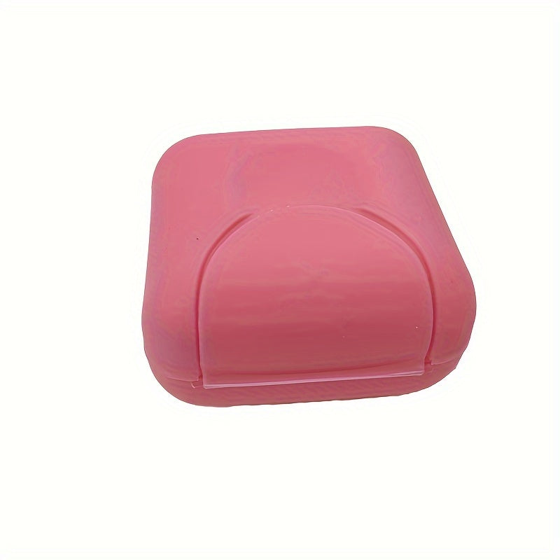 Plastic soap box with lid for travel, camping, or gym use. Waterproof and portable. Perfect for storing soap on the go.