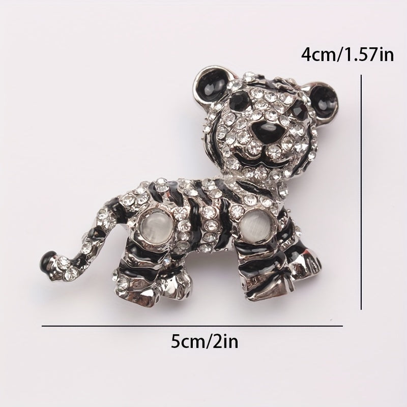 Irregularly shaped, vintage tiger brooch pin with rhinestone accent features a cute tiger design, perfect for men's suit jacket lapels.