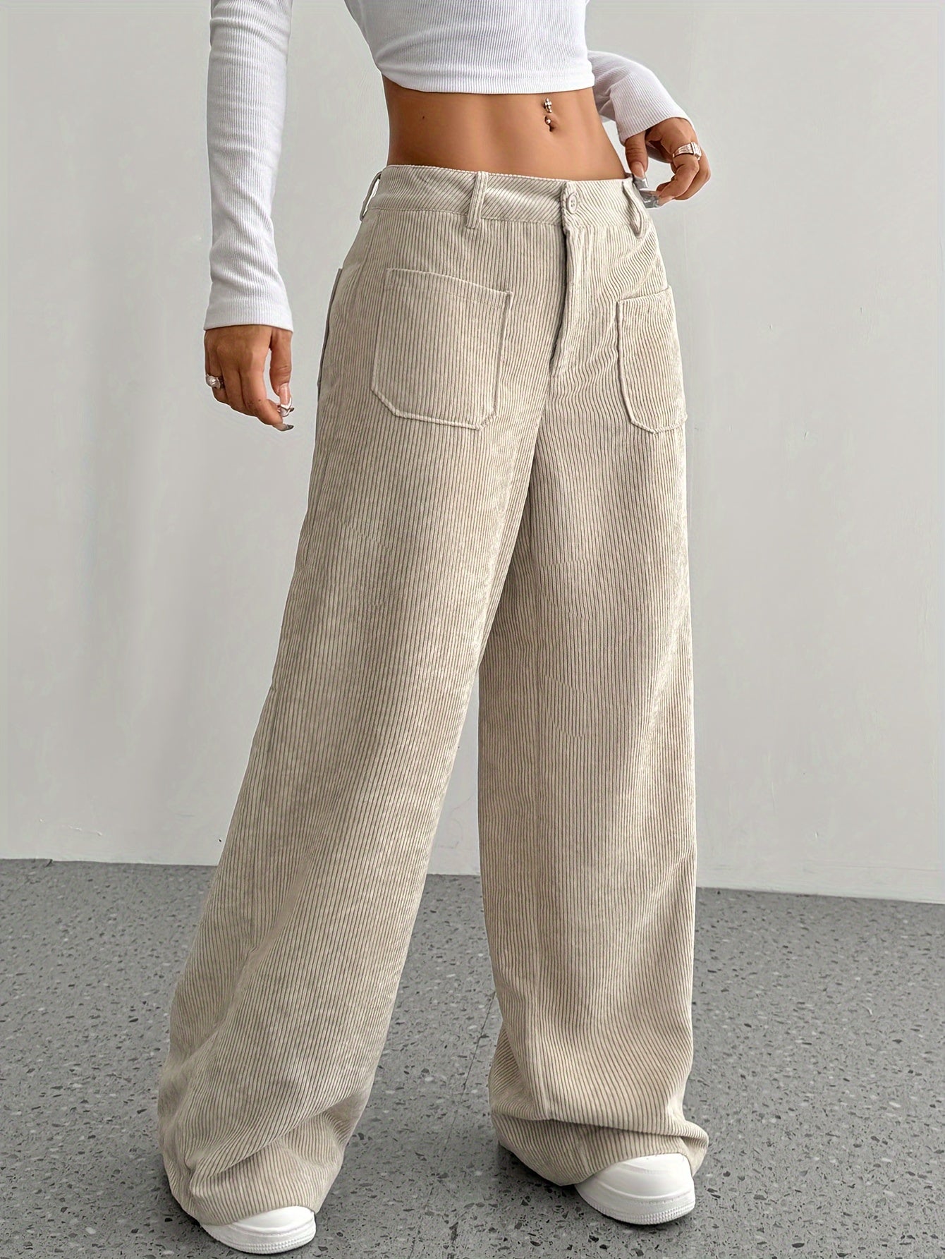 Casual corduroy wide leg pants for women made of polyester, suitable for all seasons.