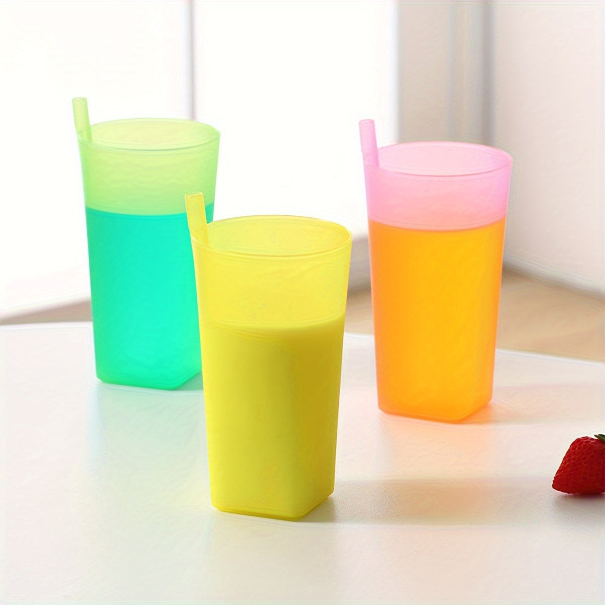 Set of 4 plastic tumblers with built-in straw, 360ml capacity, ideal for students, perfect for outdoor use, comes in assorted colors.