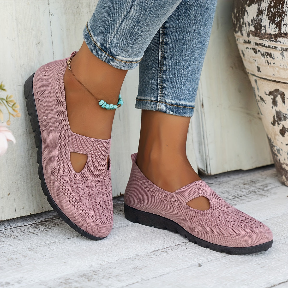 Comfortable slip-on flats with rubber sole, breathable fabric upper, support, for all-season wear.