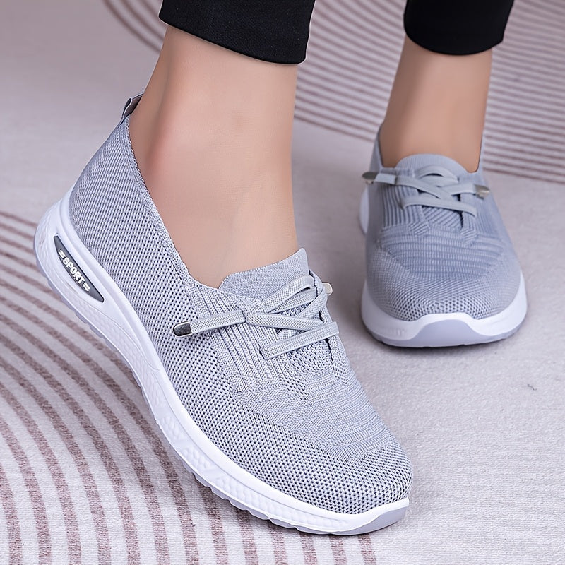 Blue slip-on sneakers for women, breathable with soft PVC sole, lightweight and stylish for casual wear.