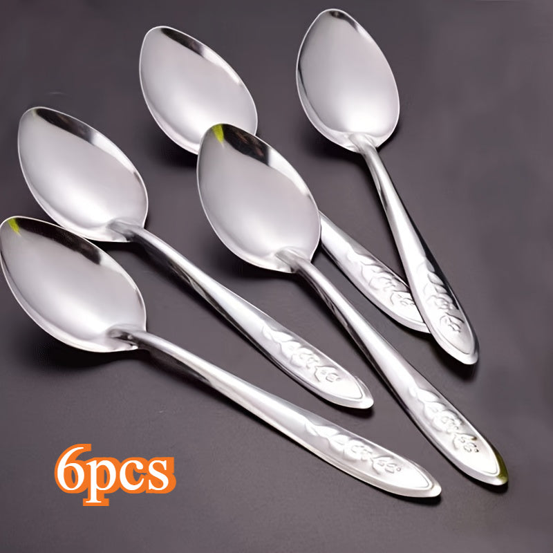 Set of 6 elegant dessert spoons made of stainless steel, featuring beautiful rose engravings. Ideal for use with coffee, fruit, and more. The shiny reflective finish makes them perfect for both home and restaurant use.