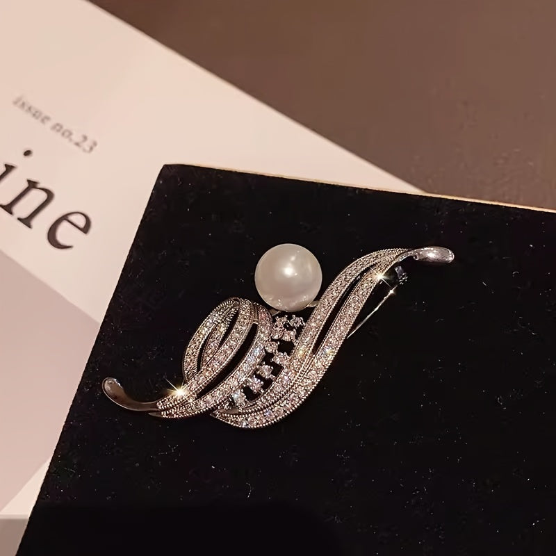 Luxurious Fashion Pin for Suit and Dress Embellishments, featuring an Elegant Alloy Brooch adorned with Sparkling Rhinestones, a Pearl Accent, and an Irregular Swirl Design.