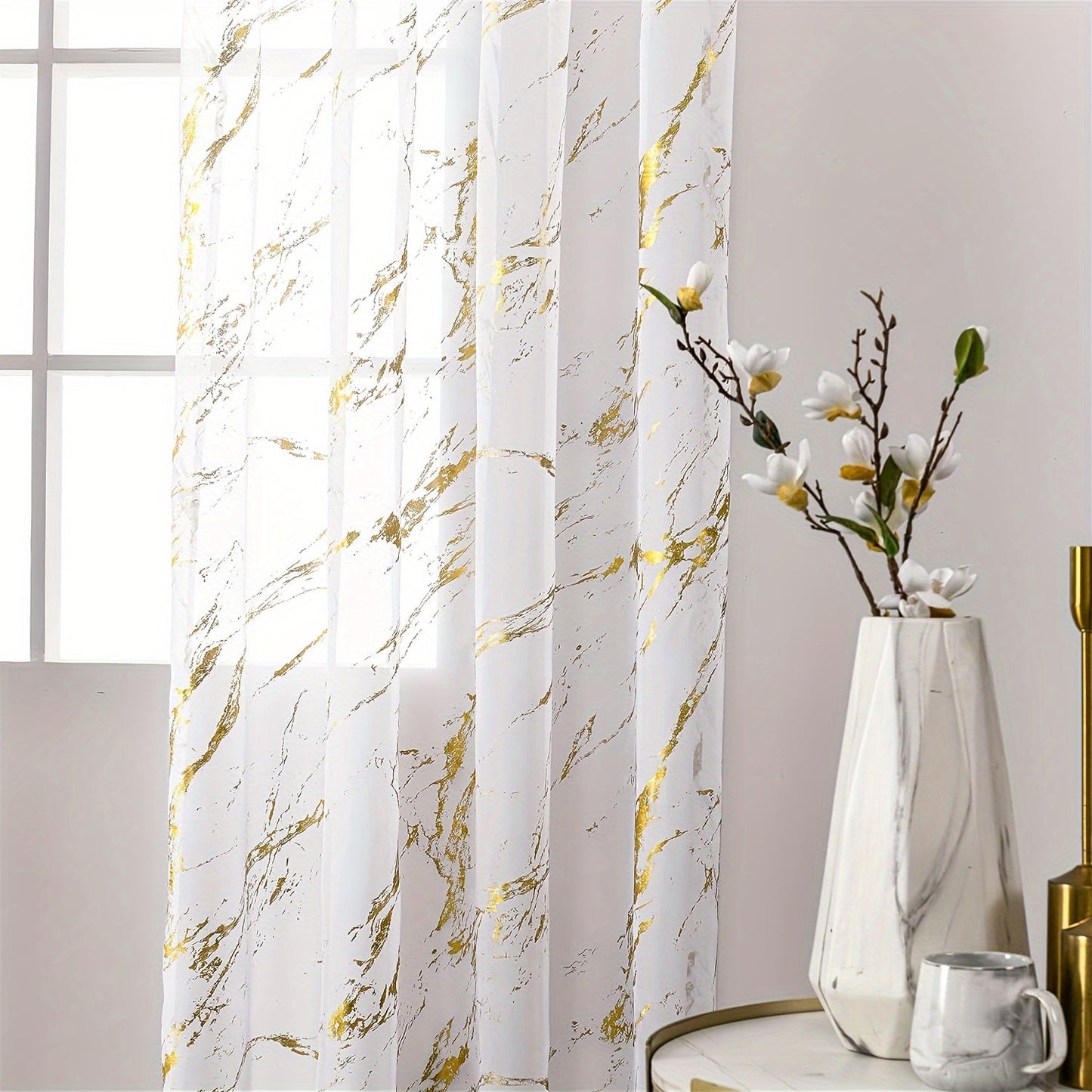 Elegant sheer curtains featuring a marble pattern print, perfect for enhancing the decor of living rooms, bedrooms, and office windows.