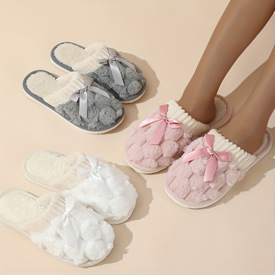 Winter plush cozy non-slip shoes with soft sole and flat bowknot decoration, ideal for home warmth.