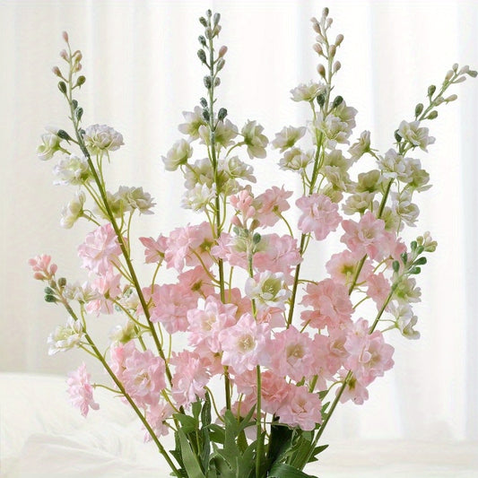 4 pink artificial Delphinium flowers for decoration with a lifelike, realistic touch. Ideal for tall vases in home, wedding or office.