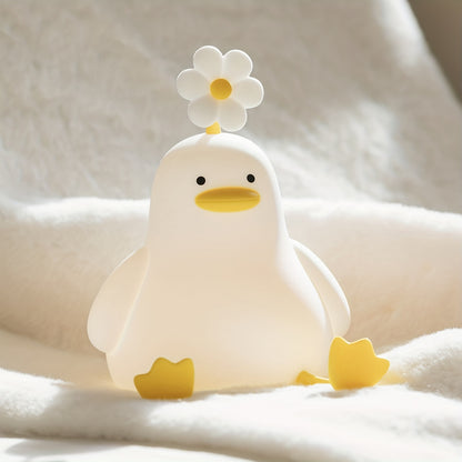 Cute Flower Duck Night Light with adjustable brightness and rechargeable feature, a creative gift for kids.