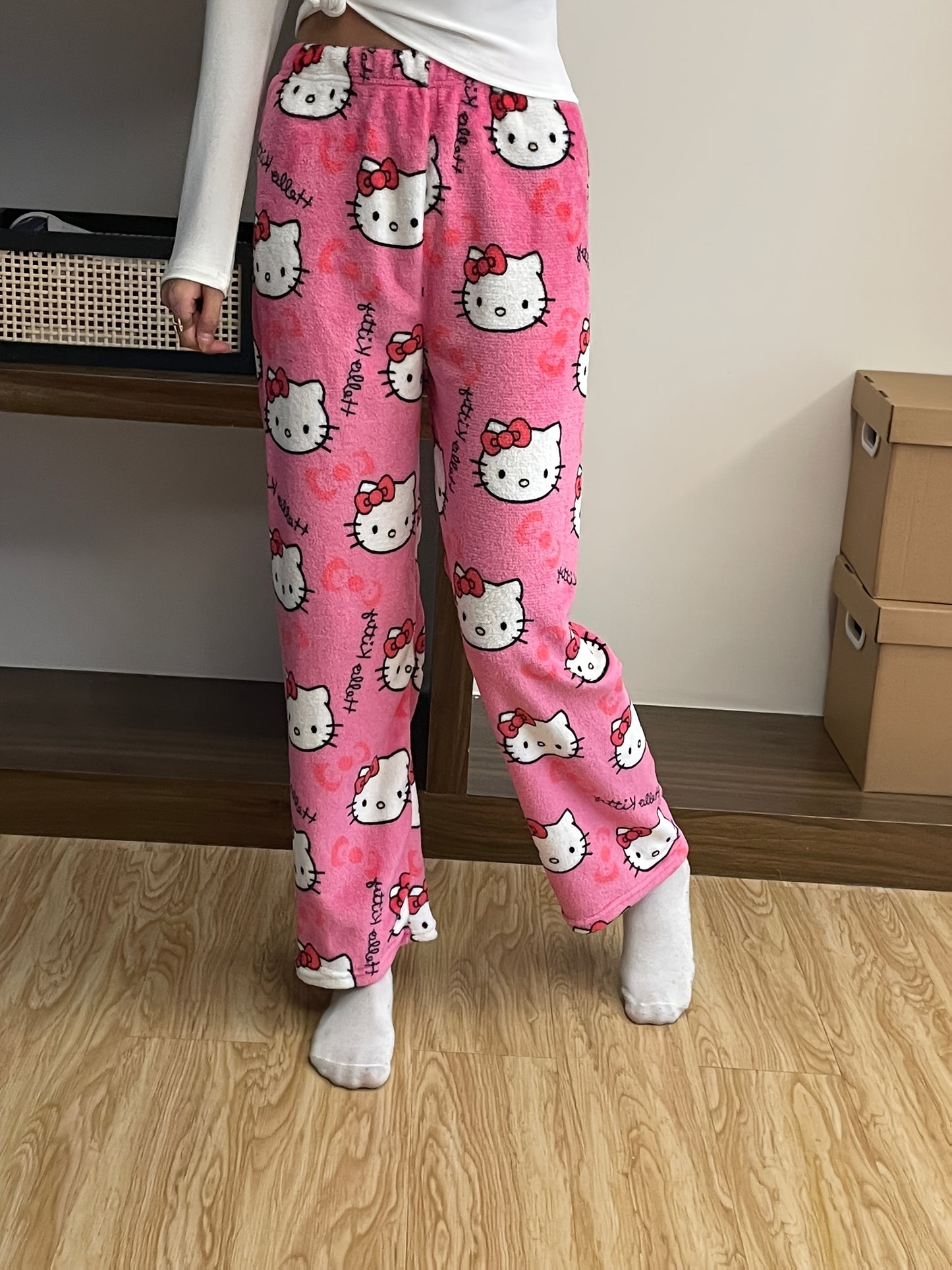 Sanrio Hello Kitty cozy flannel pajamas for women, officially licensed and perfect for relaxing and sleepwear.