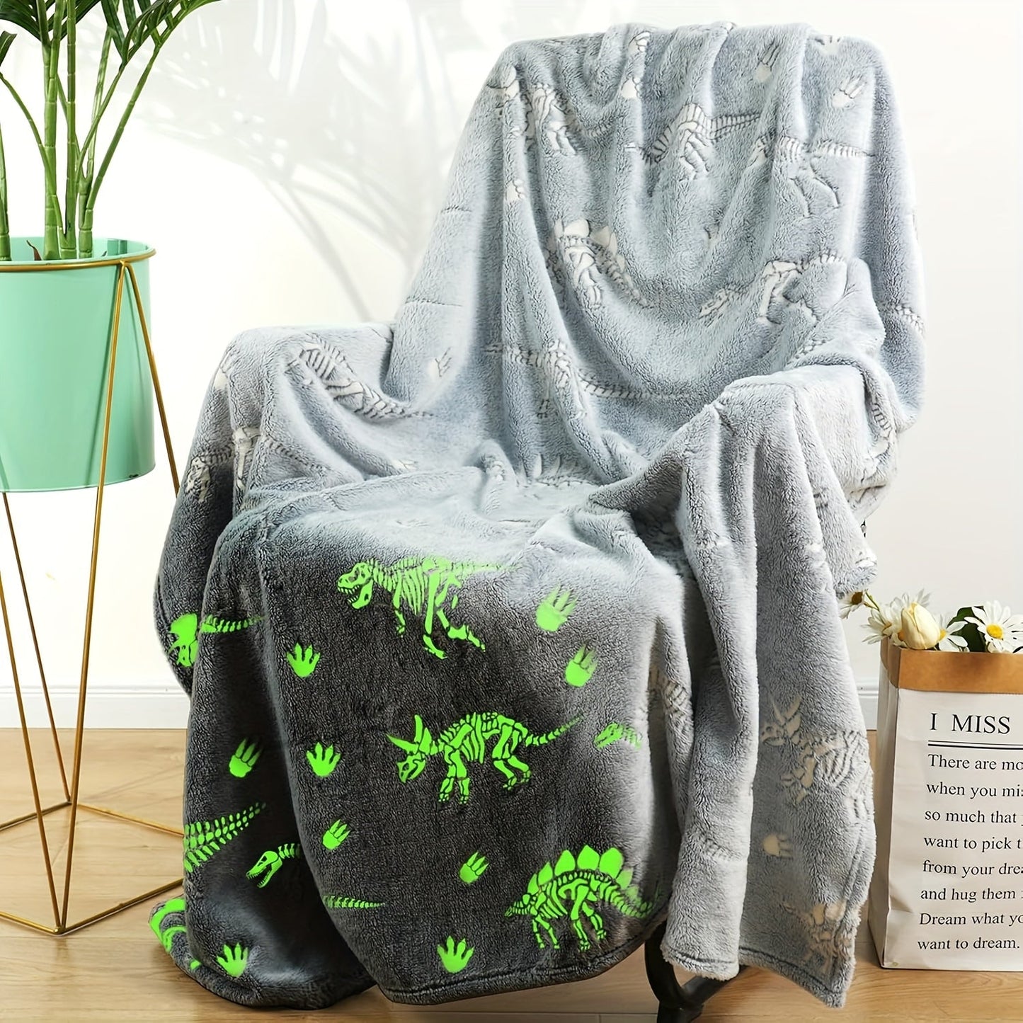 This Glow in the Dark Dinosaur Flannel Throw Blanket is perfect for all seasons, providing soft and comfortable warmth. It is suitable for use on the sofa, bed, car, or in the office. Made of machine washable polyester with a weight of 250-300gsm, this