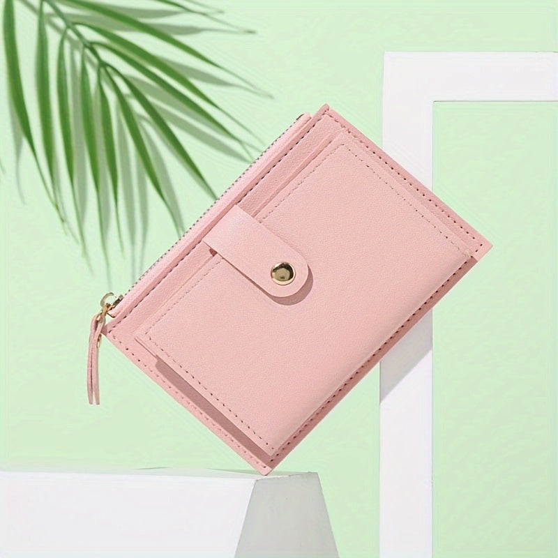 Sleek women's wallet with snap button zipper in pink, light brown, blue, and black. Lightweight, portable, bifold design made of TSA-approved PU material. Ideal for cash, ID, credit cards